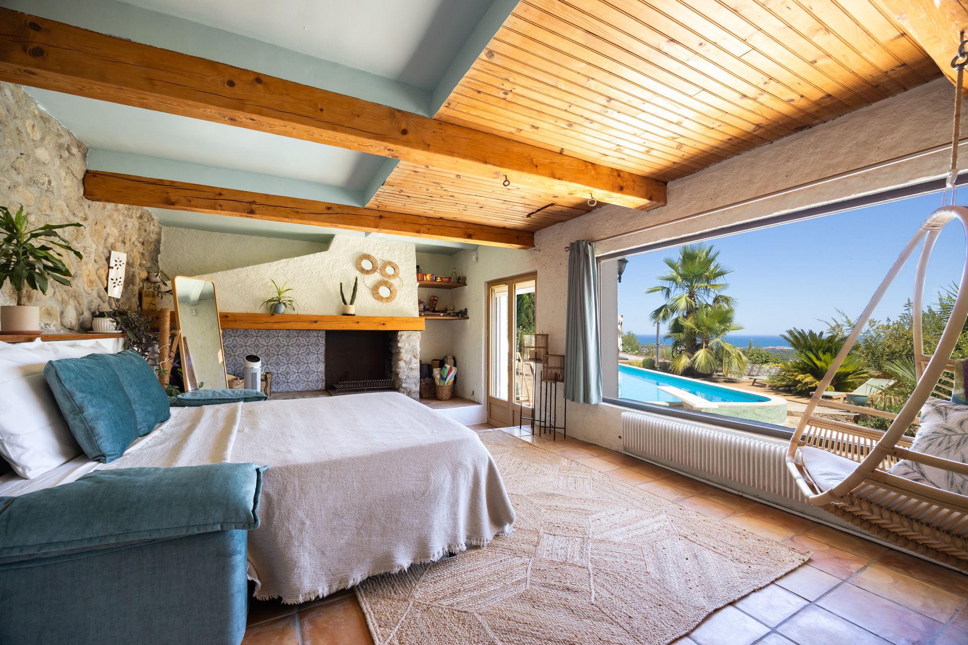 Bedroom with pool and sea view